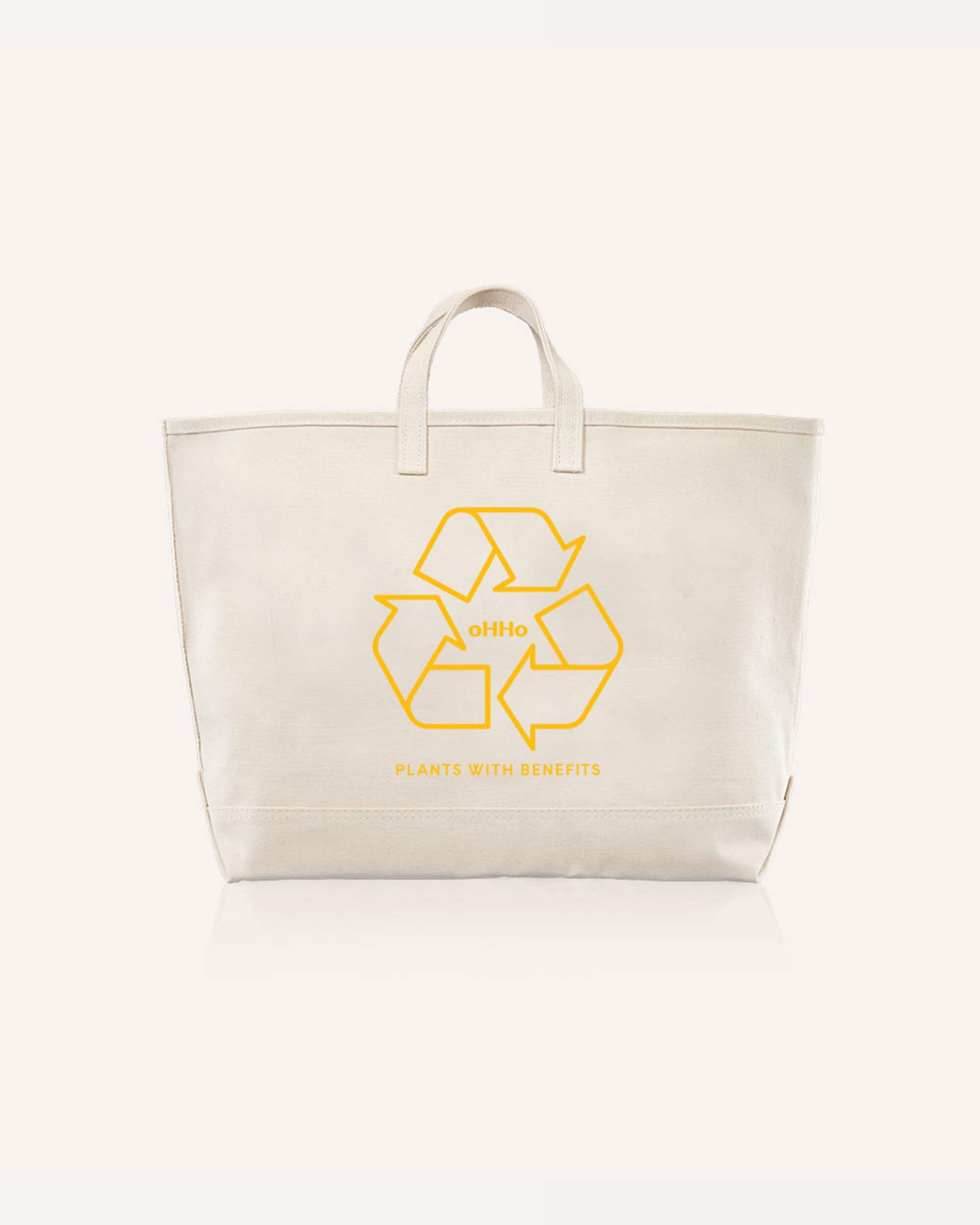 A canvas tote bag with oHHo logo on it in yellow back