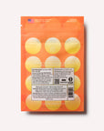 Orange and yellow package of Lemon ginger dots for a nice since of calm, back of bag
